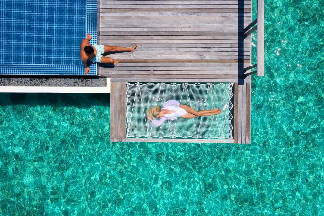Casa de luxo sobre a água com piscina privativa e acesso grátis ao lounge VIP de hidroavião na chegada e crédito de USD 50 no spa